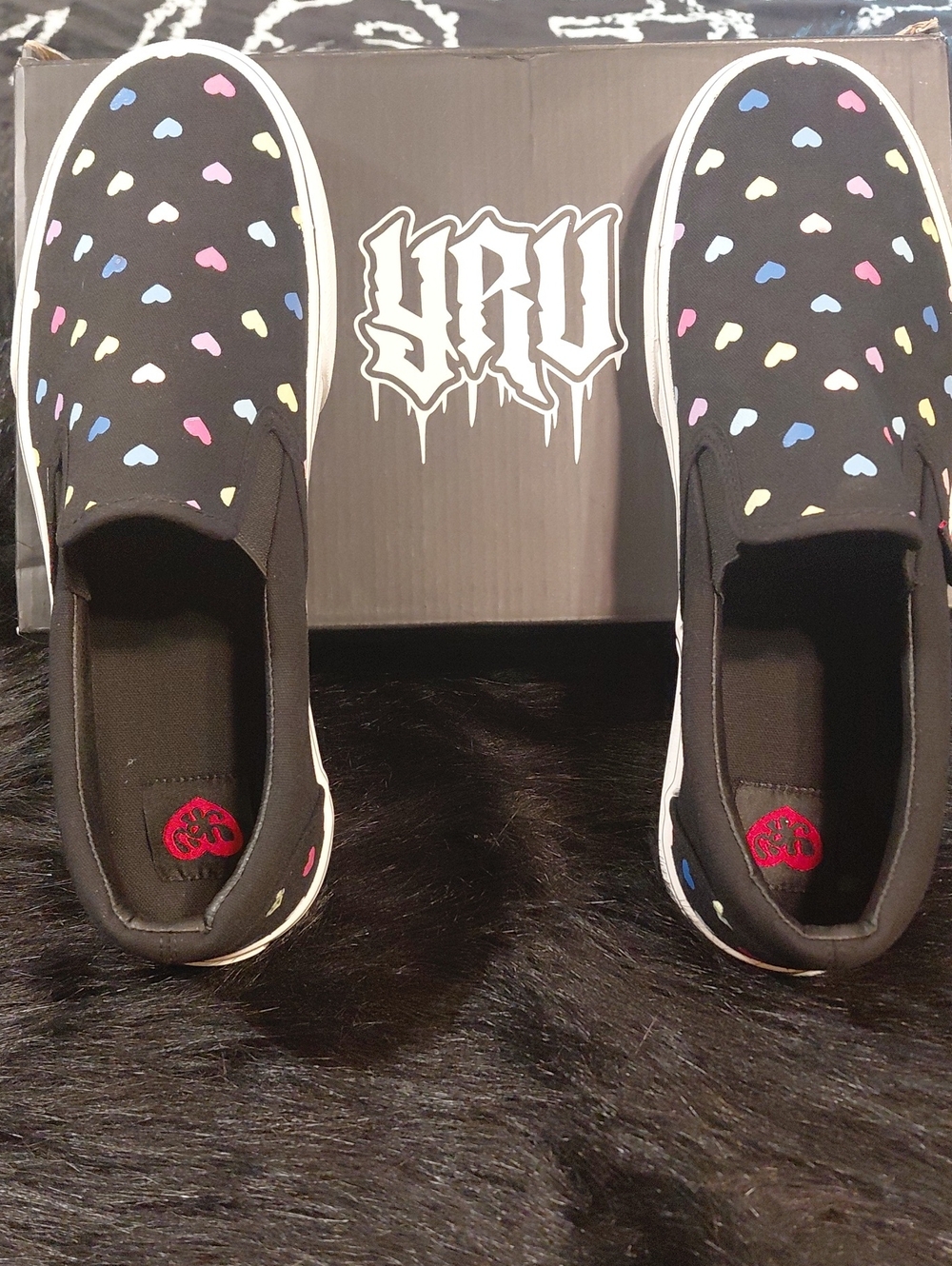 STRANGECVLT SIZE 10 Black Slip-On Canvas Shoes with Multicolor Heart Pattern